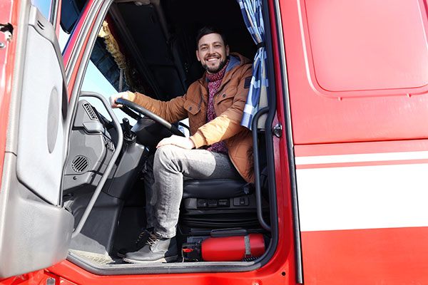 driver-4 driver in red truck smiling