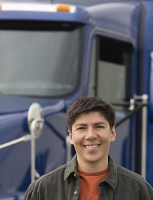 young man in front of his truck young man in front of his truck